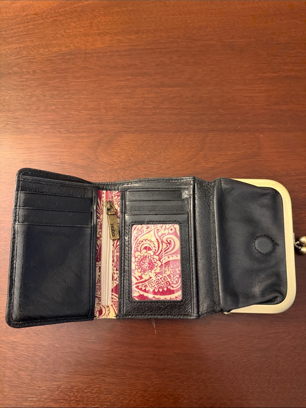 HOBO Black Leather Trifold Wallet with Pink Patterned Lining